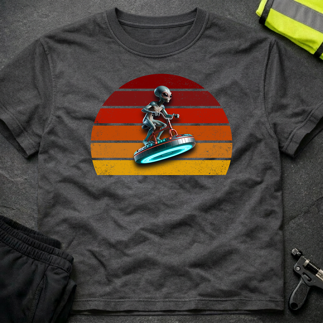 Alien riding an alien bicycle T-Shirt