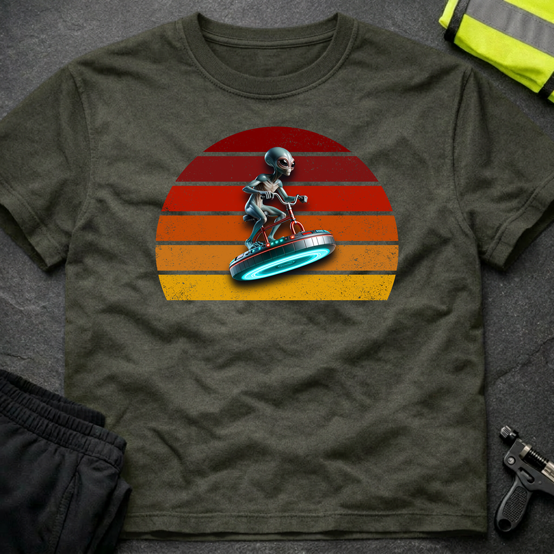 Alien riding an alien bicycle T-Shirt