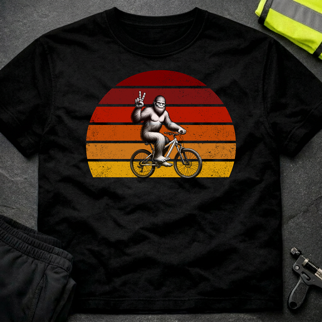 Bigfoot on a bicycle T-Shirt