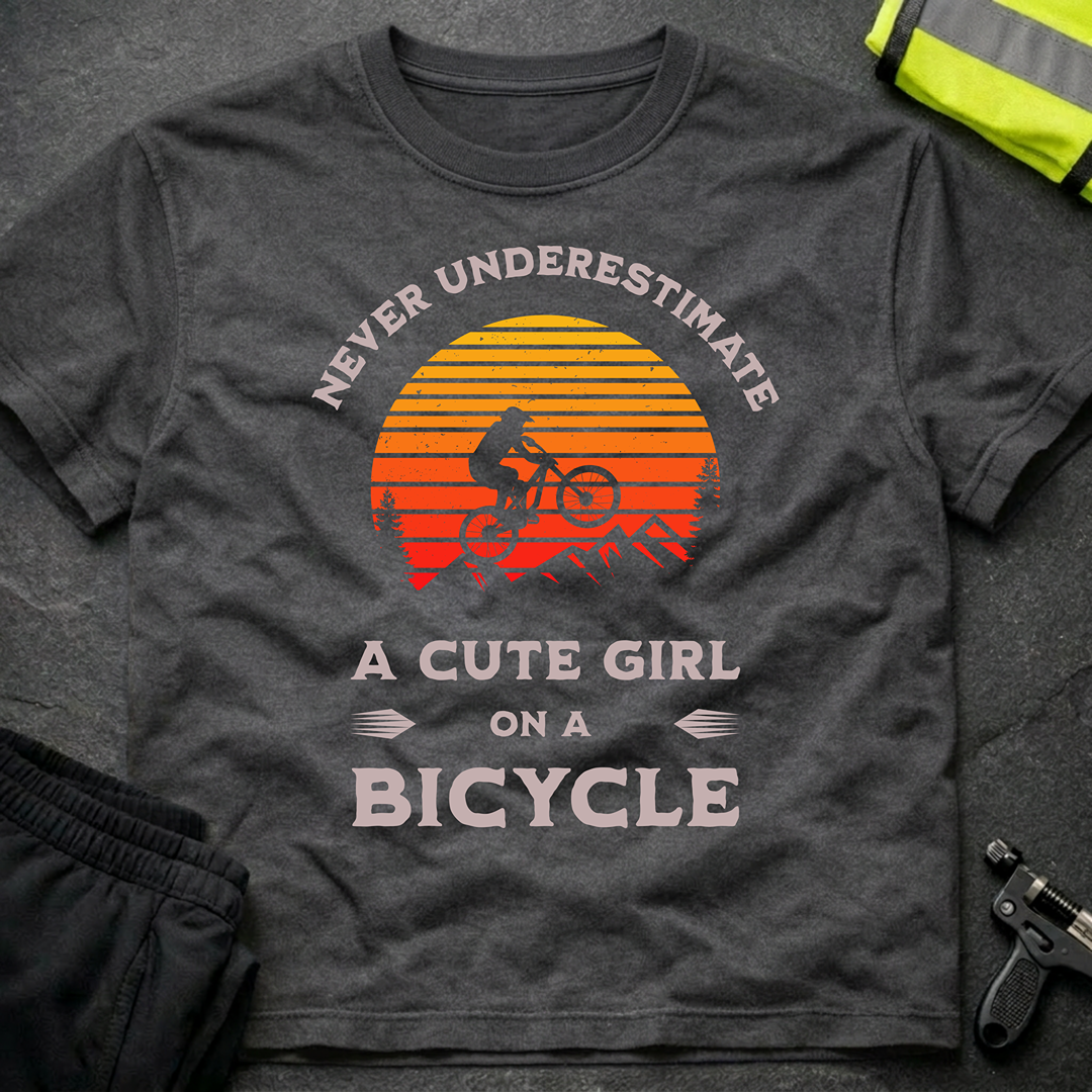 Never underestimate a cute girl on a bicycle T-Shirt